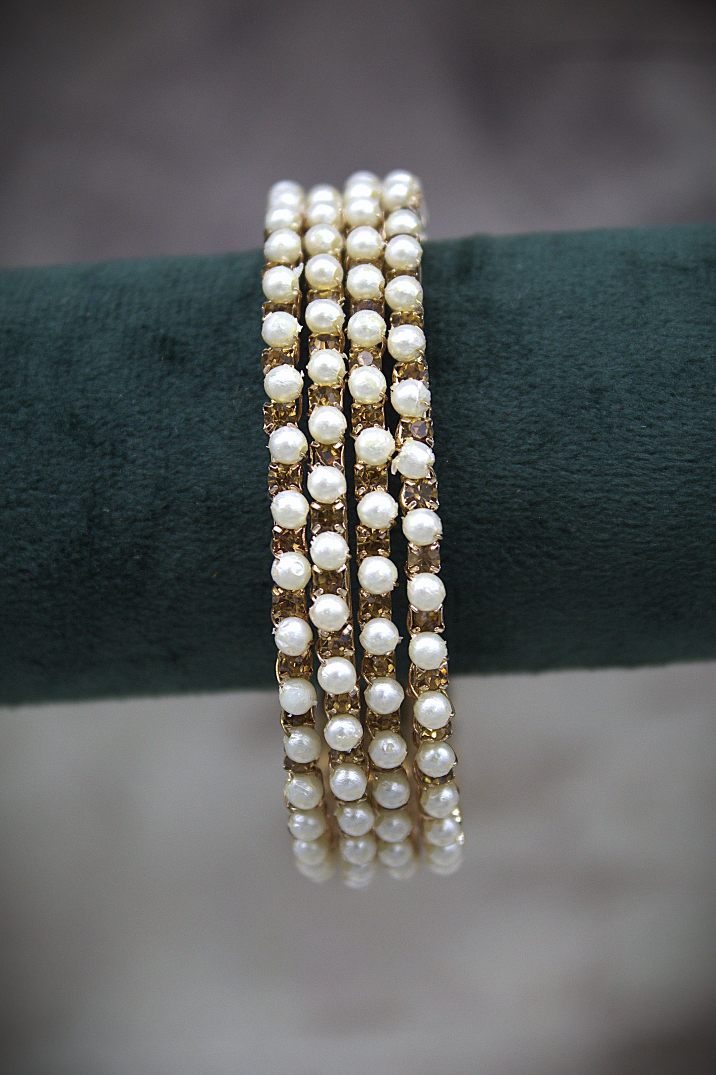 Dhaara Stone And Pearl Bangles